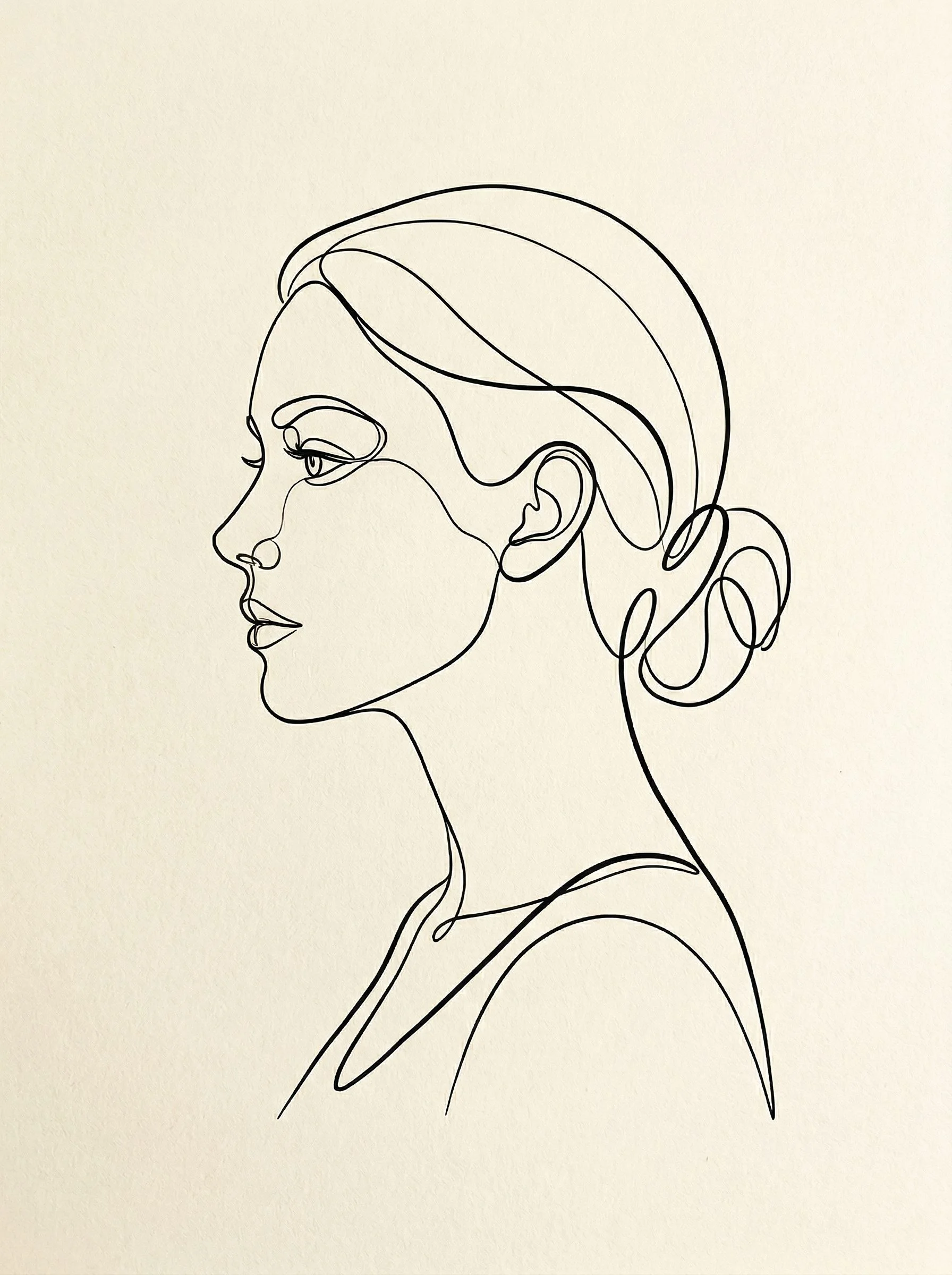 Continuous single-line drawing of a woman's face in profile. Elegant minimalist line art on a warm cream background. One flowing black line creates the entire portrait. Sophisticated, modern, gallery-quality. Perfect for a bedroom or office. Clean and refined aesthetic. No text, no frame.